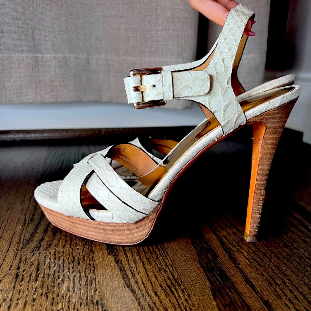 White coach heels